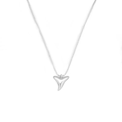 Accessorizing Silver Shark Tooth Necklaces with Other Jewelry