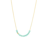 Dainty gold necklace chain with small turquoise beads. Beaded necklace
