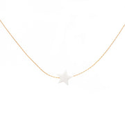 White pearl pendant in the shape of a star on a dainty gold chain.