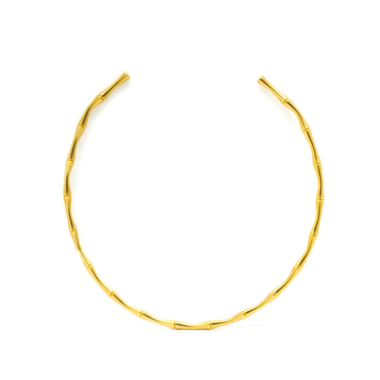 A choker necklace with bamboo-inspired links or design