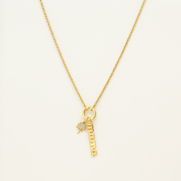 A gold necklace with the word “Mama” on it