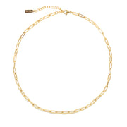 Flat lay of a gold paperclip necklace chain with adjustable sizing and clasp