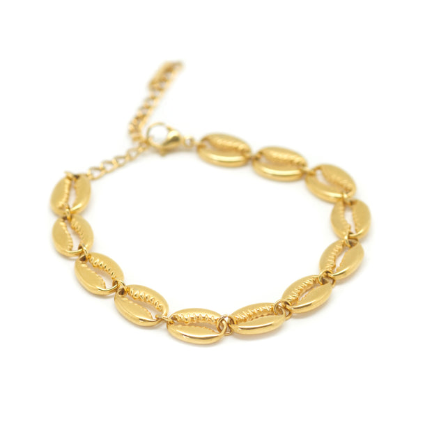 Gold puka shell bracelet with adjustable links.