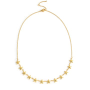 A necklace featuring a detailed starfish charm