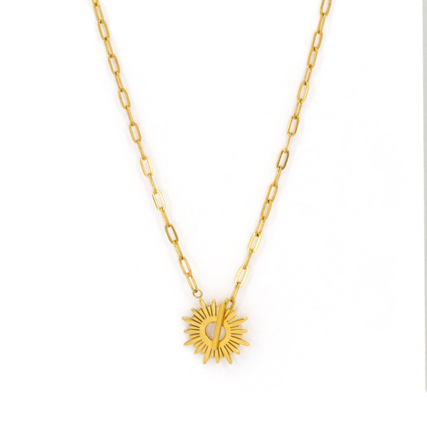 Gold necklace with sun pendant