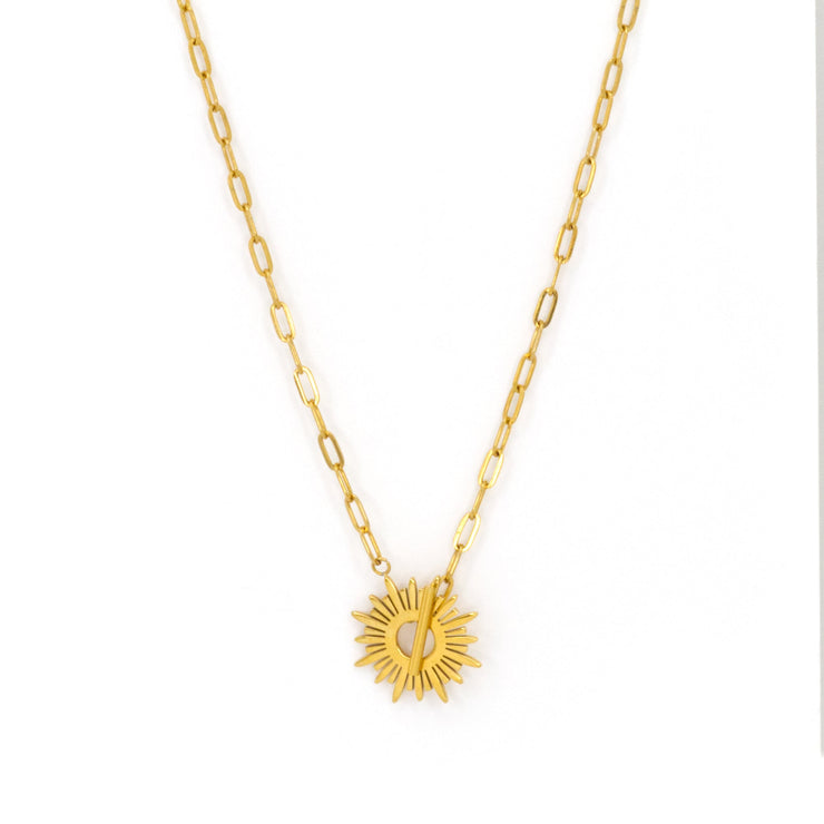 Gold necklace with sun pendant