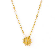 Gold necklace with sun pendant