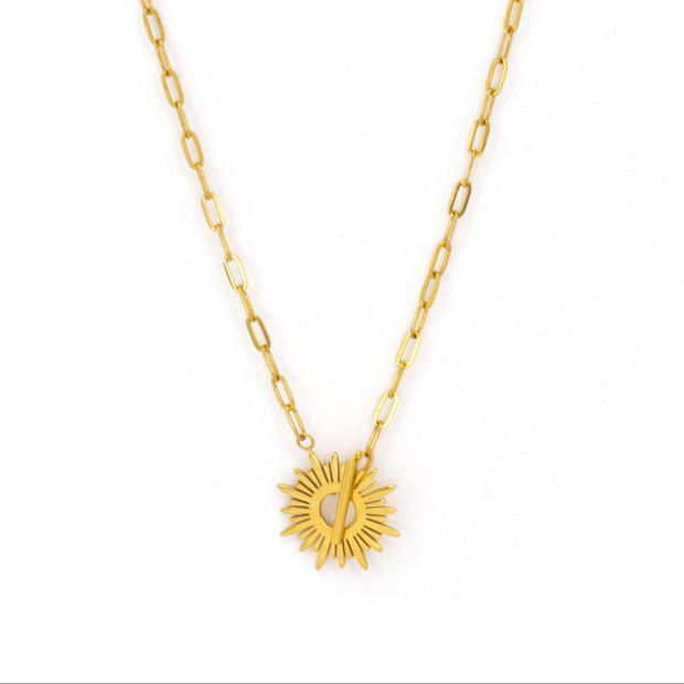Gold necklace with sun pendant