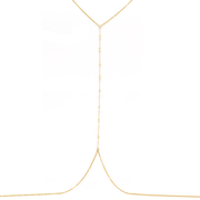 A delicate jewelry chain designed to be worn across the body