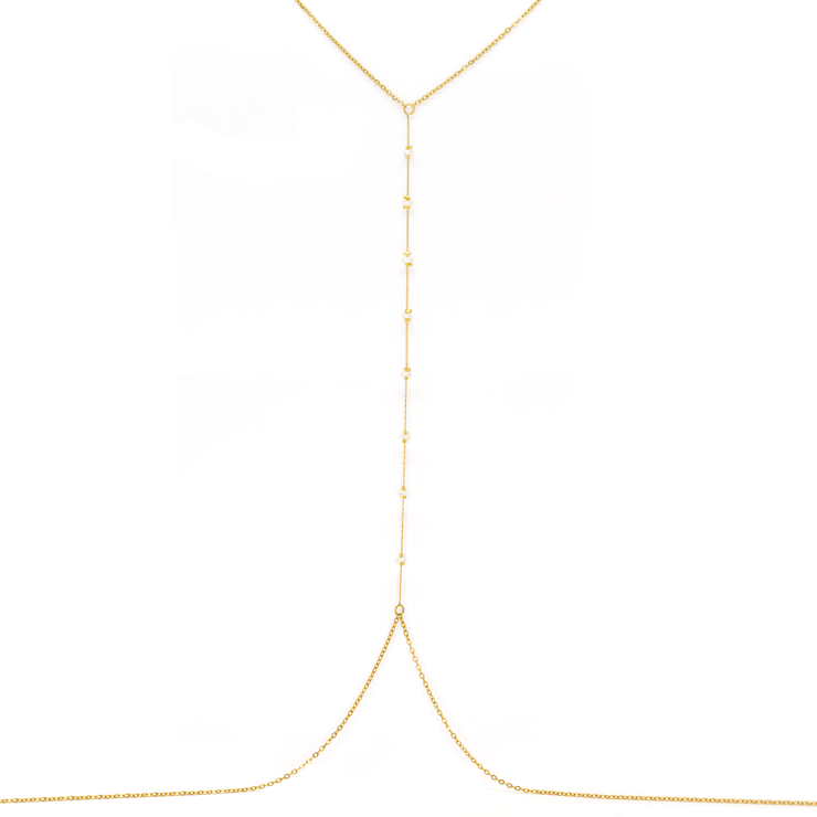 A delicate jewelry chain designed to be worn across the body