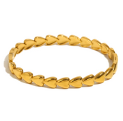 gold heart shaped bracelet