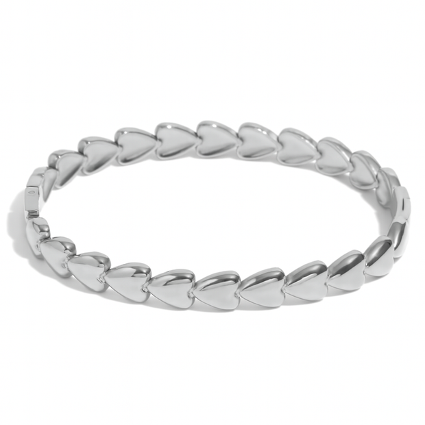 silver band bracelet made up of hearts