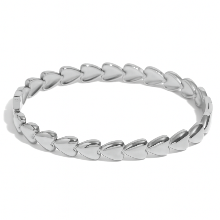 silver band bracelet made up of hearts