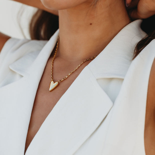 heart pendant on a gold chain necklace