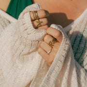 A dainty ring featuring small freshwater pearls