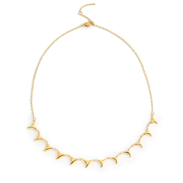 A choker necklace featuring shark tooth charms