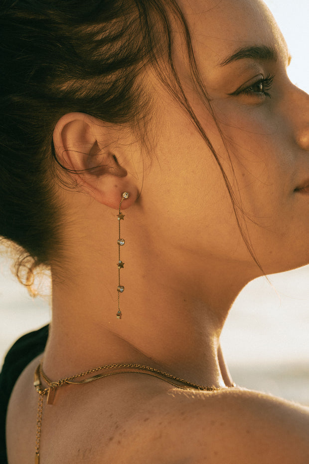 Small stud earrings with a sparkling star design
